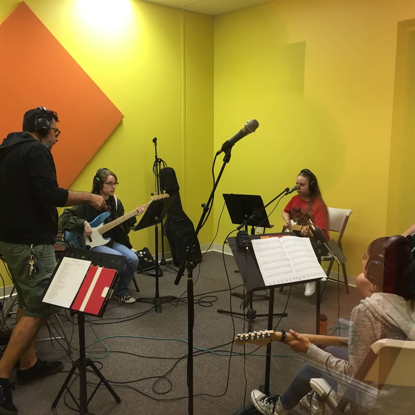 Students rehearsing together in band practice session